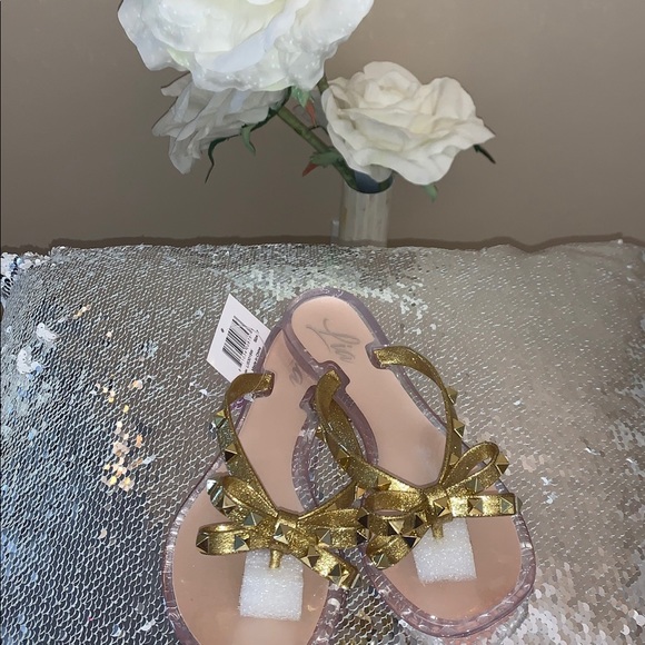 dizzy studded bow jelly sandals